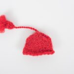 Miniatyrlue i strikk fra Grini